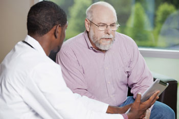 Man talking with his doctor